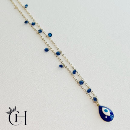 chain with blue crystals and evil eye pendant